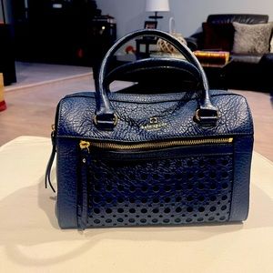 Blue Kate Spade handbag with shoulder strap